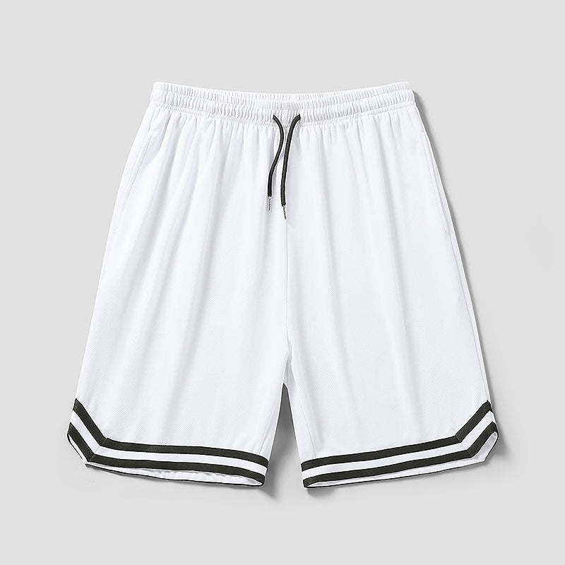 White shorts with black trim on a gray background
