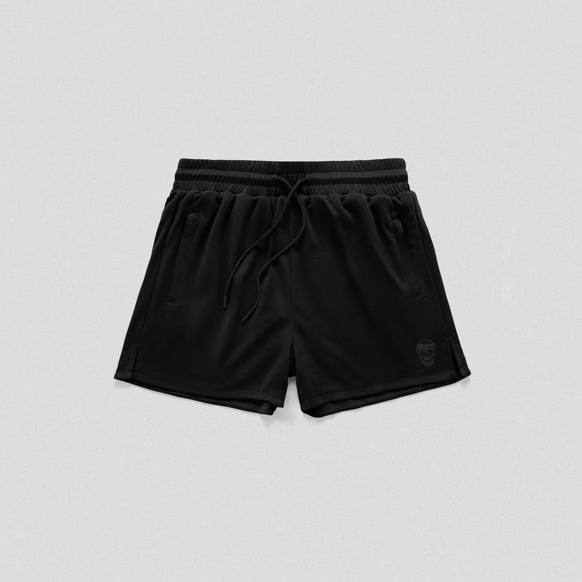 Black athletic shorts with an elastic drawstring waistband and side pockets, shown flat against a light gray background.