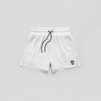 White shorts with a black drawstring and small logo on a light gray background