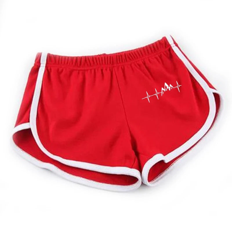 Red shorts with white trim on a white background